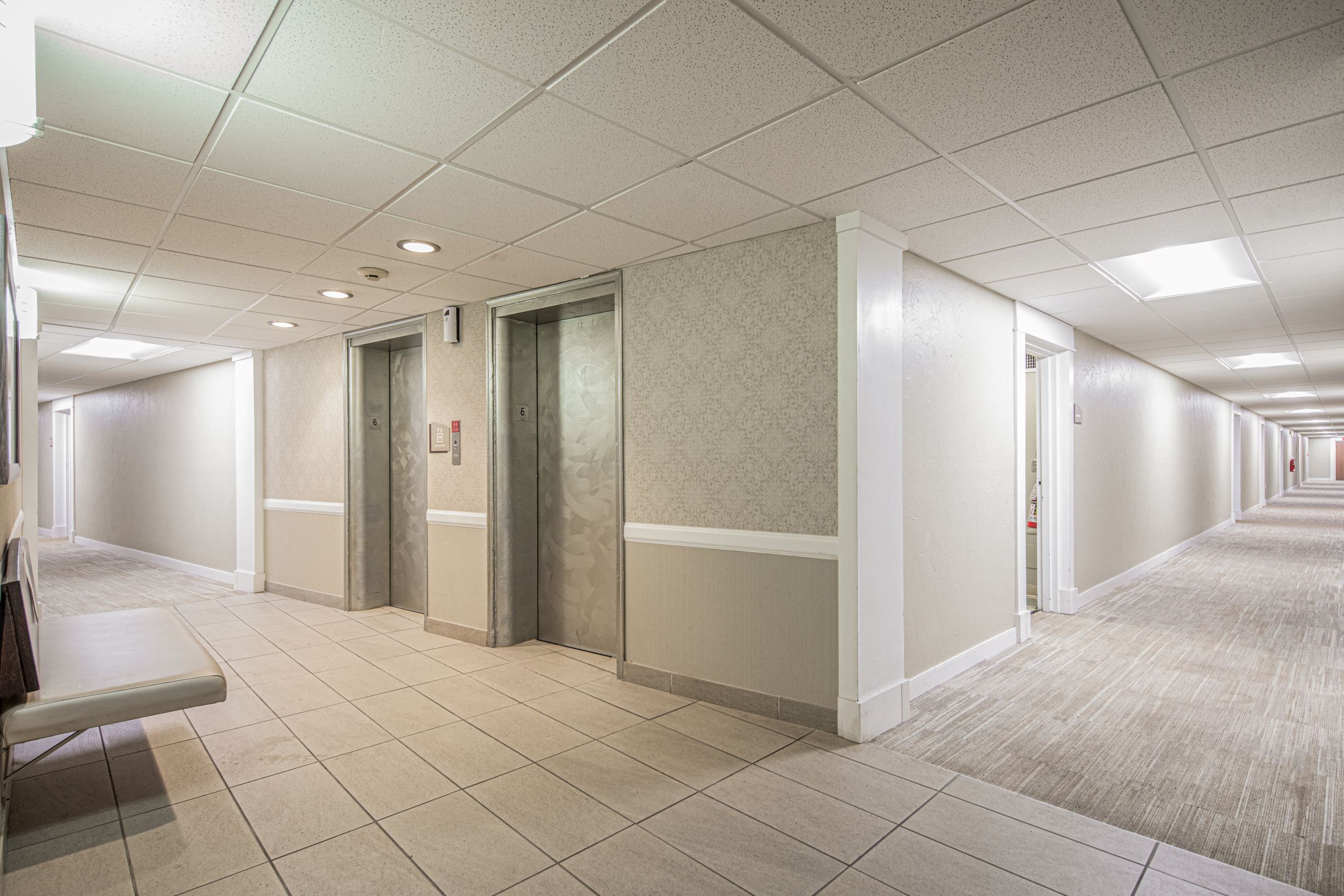 Bright hallways with two elevator banks